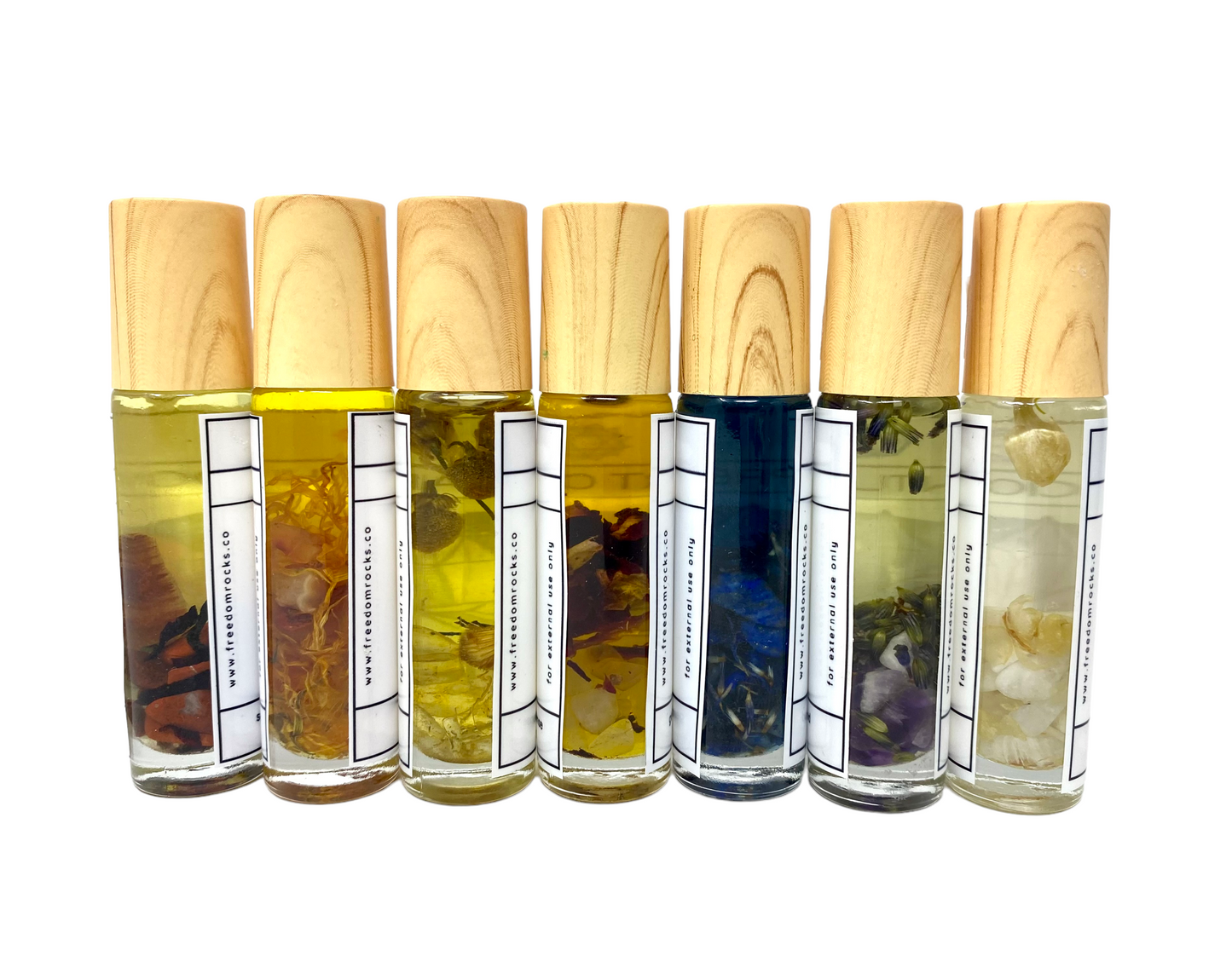 Chakra Essential Oil Infused with Herbs and Crystals