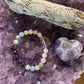 Valentines Day Gift Set Includes (1) Attract Love Gem Bead Bracelet (1) 3" Cleansing sage Bundle and (1)  2" Puffed Chevron Amethyst Heart